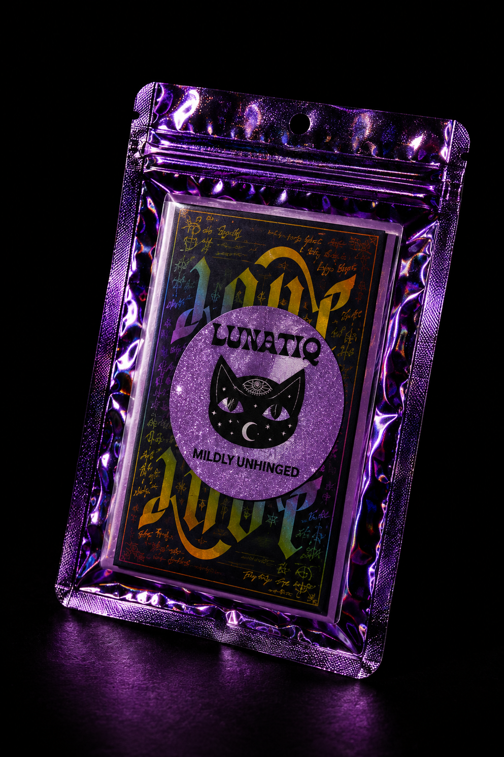 A holographic purple Lunatiq Mildly Unhinged mystery package photographed against black